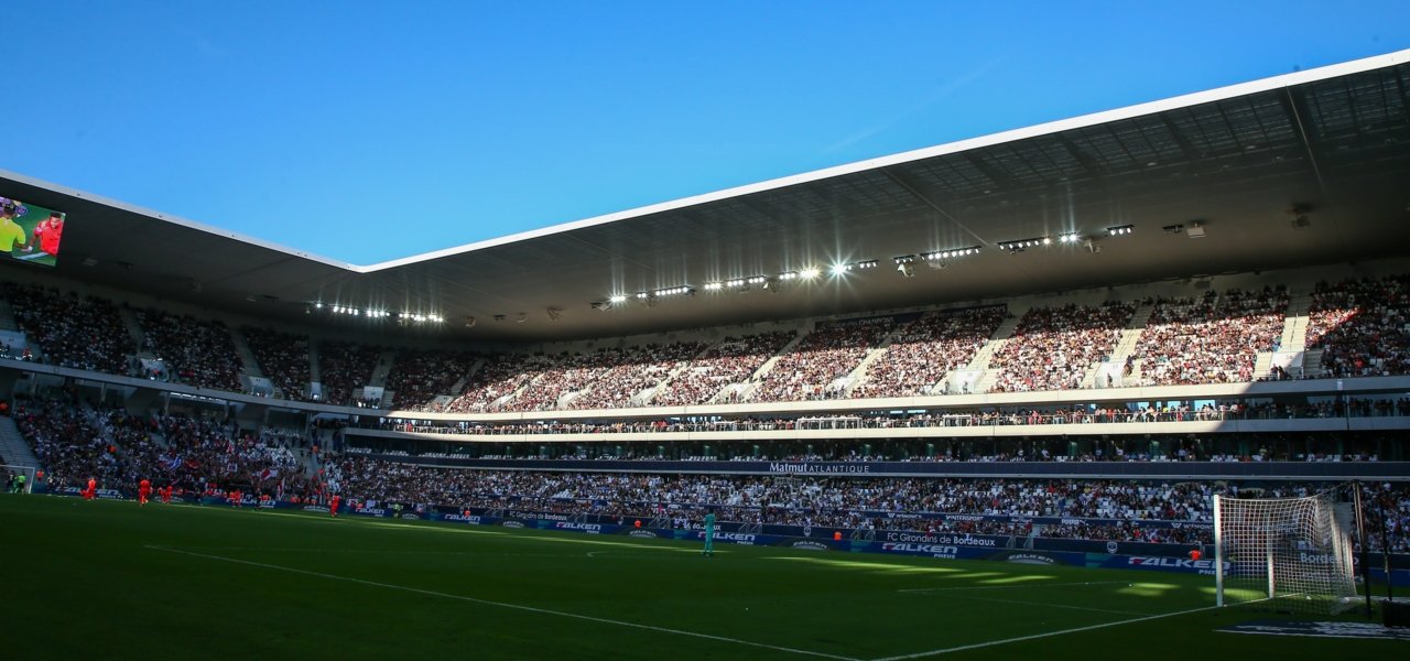 Blue sky and a football stadium - Wine Paths